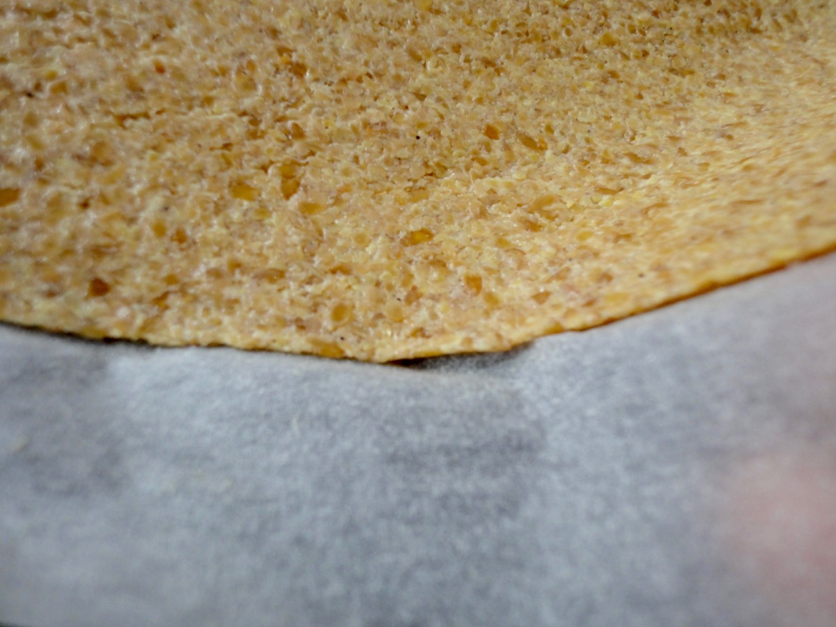 Roll it out as thin as you can between 2 parchment papers.